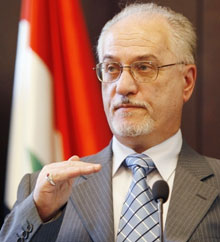 Iraqi Oil Minister Hussein al-Shahristani answers a question during a news conference in Beijing October 28, 2006. China and Iraq will start next month to discuss issues as to how to revive the Saddam-era Ahdab oil development contract, Iraqi minister said on Saturday. 