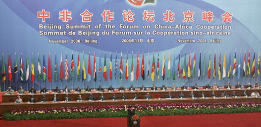 China's President Hu Jintao (front) delivers his speech at the opening ceremony of the China-Africa Summit at the Great Hall of the People in Beijing, November 4, 2006. China will provide $5 billion in loans and credits to Africa over the coming three years and double aid to the backward but resource rich continent by 2009, Hu said on Saturday. 