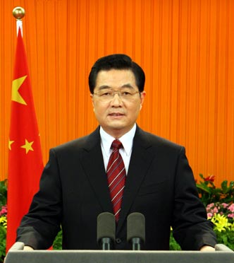 Chinese President Hu Jintao delivers his New Year Address, broadcast through China Radio International (CRI), China National Radio (CNR) and China Central Television (CCTV), in Beijing, ahead of the New Year's Day 2007.