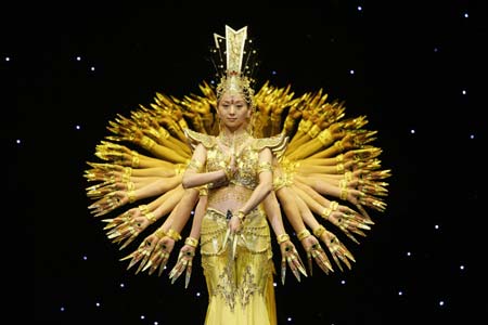 Deaf artists from the China Disabled People's Performing Art Troupe dance during a dress rehearsal for their show 