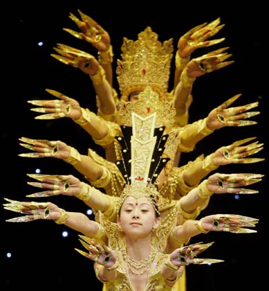 Deaf artists from the China Disabled People's Performing Art Troupe dance during a dress rehearsal for their show 