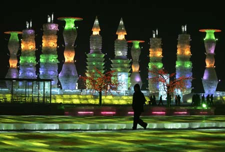 People visit at an ice sculpture art exhibition for the upcoming the China Harbin international ice and snow festival in Harbin, northeastern China's Heilongjiang Province, January 4, 2007. 