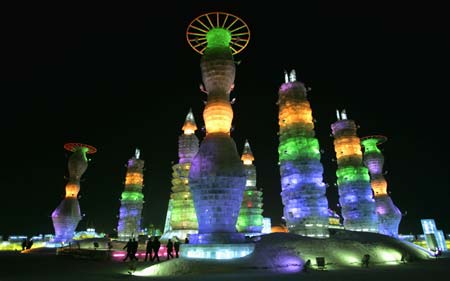 People visit at an ice sculpture art exhibition for the upcoming the China Harbin international ice and snow festival in Harbin, northeastern China's Heilongjiang Province, January 4, 2007. 