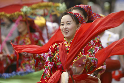 Performers from the China Shanxi Folk Art Theatre take part in a parade celebrating the Lunar New Year in Valletta February 13, 2007. The Lunar New Year, which is the Year of the Pig according to the Chinese lunar calendar, will fall on February 18 this year.