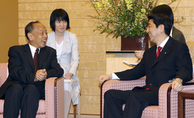 ,li zhaoxing,shinzo abe,japan