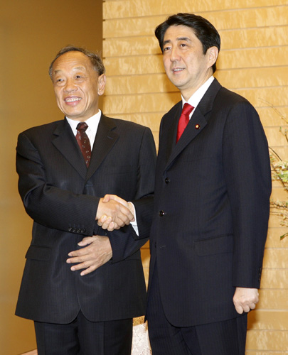 ,li zhaoxing,shinzo abe,japan