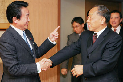 li zhaoxing,shinzo abe,japan