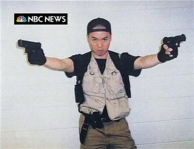 This video frame grab image taken from a video aired by NBC News on Wednesday, April 18, 2007 shows Virginia Tech gunman Cho Seung-Hui. The video was part of a package allegedly mailed to the network on Monday, April 16 between Cho's first and second shootings on the Virginia Tech campus. NBC said that a time stamp on the package indicated the material was mailed in the two-hour window between the first burst of gunfire in a high-rise dormitory and the second fusillade, at a classroom building. Thirty-three people died in the rampage, including the gunman, who committed suicide. (AP Photo/NBC