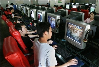 Chinese youth play online computer games at an internet cafe in Shanghai, 22 May 2007. 