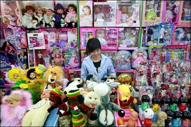 A woman selling Chinese made toys waits for customers at a shopping center in Beijing, 02 August 2007.