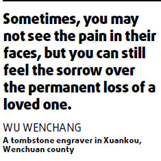 Quake sorrow etched in stone