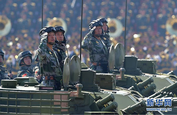China announces 7.6% defense budget rise, lowest in six years