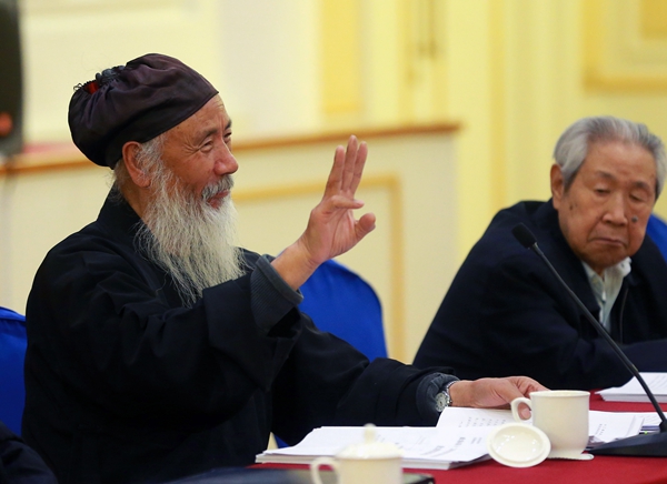 Religious masters attend panel discussion during Two Sessions