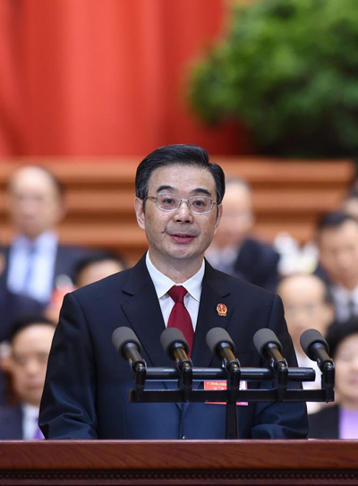 Head of China's top court delivers work report