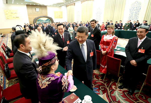 Xi calls for building 'great wall of iron' for Xinjiang's stability
