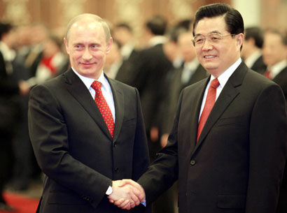 Putin, Hu Jintao meet in Beijing