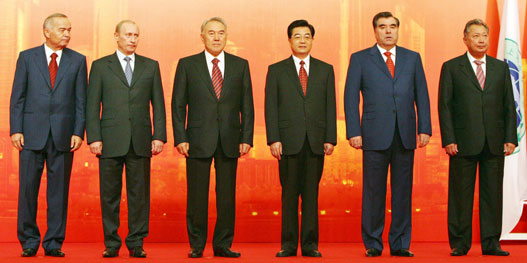 (From L-R) Uzbekistan's President Islom Karimov, Russia's President Vladimir Putin, Kazakhstan's President Nursultan Nazarbayev, China's President Hu Jintao, Tajikistan's President Imomali Rakhmonov and Kyrgyzstan's President Kurmanbek Bakiyev pose during a group photo session at a summit of the Shanghai Cooperation Organization (SCO) in Shanghai June 15, 2006.