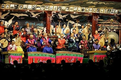 Naxi Orchestra members play songs in Lijiang