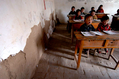 Luxury gov't office building; shabby student clas