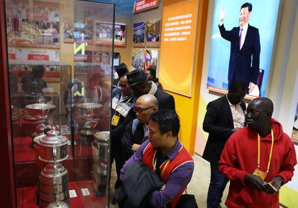 Foreign journalists visit exhibition showing China's progress