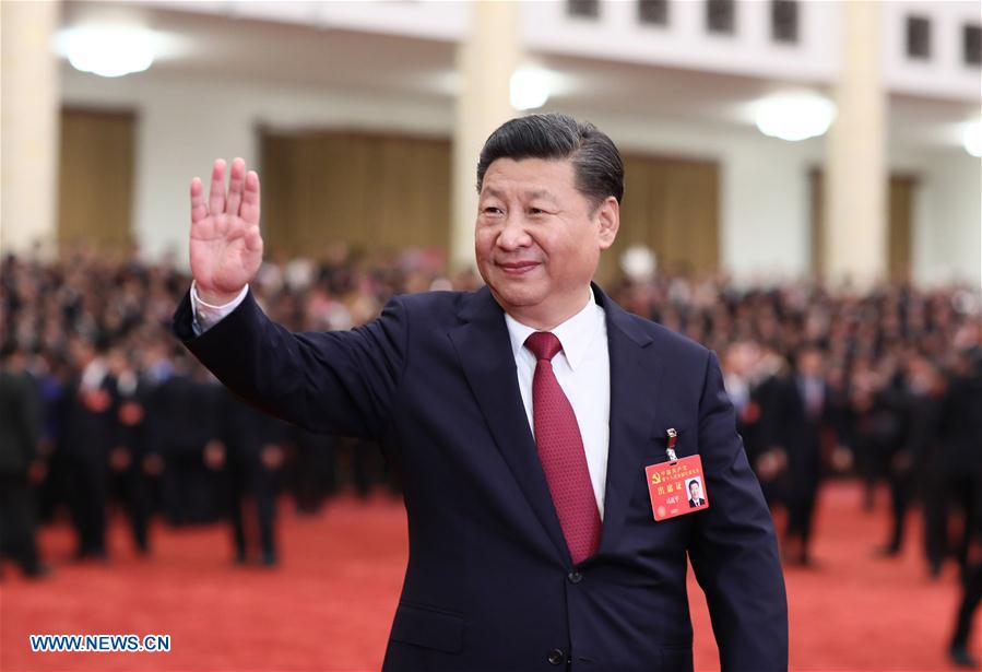 Xi meets congress delegates