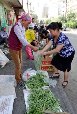 Traffic curfew lifted, tension remains in Urumqi