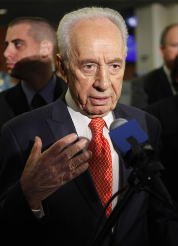 Peres resists Gul's call for an apology on raid