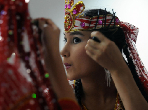Folk dances stage at Xinjiang Pavilion