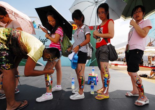 Body painting marks 100 days of Expo