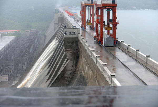 Dams strained as rains pound flooded NE China