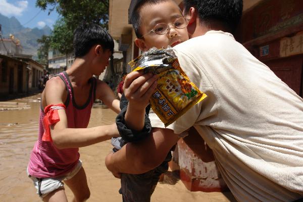 58 saved from rain-triggered mudslides in NW China