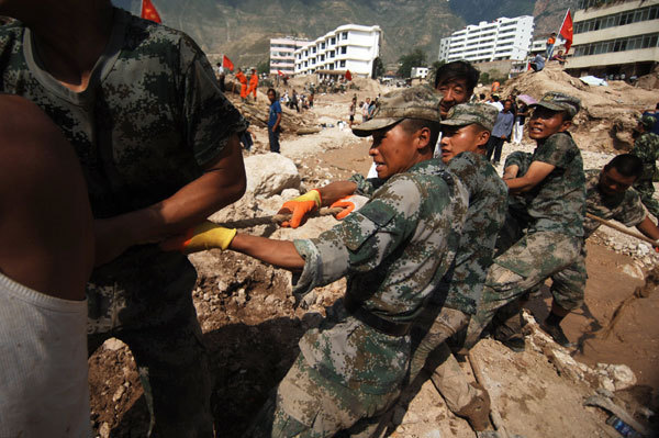 Aid, supplies pour into mudslide-flattened Zhouqu