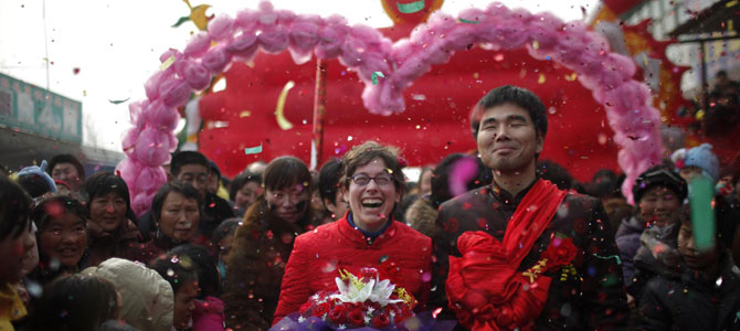 Chinese husband, American wife hold rural wedding