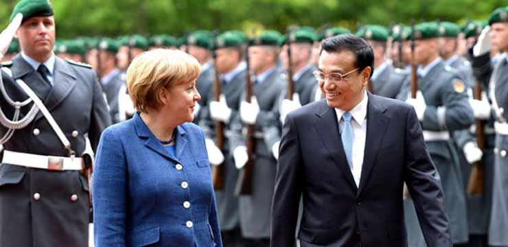Li attends welcoming ceremony held by Merkel
