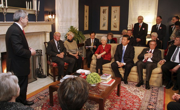 Xi charms hosts in Iowa