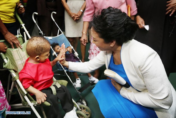 Peng visits children with intellectual disability