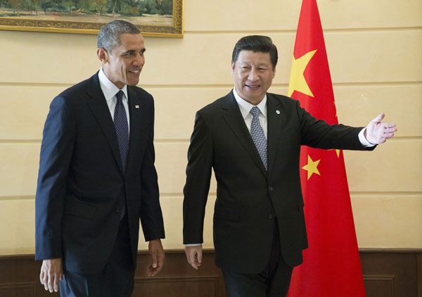 Xi hails progress in China-US ties as he meets Obama
