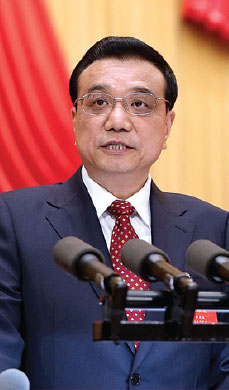Li calls for a 'new attitude' by officials