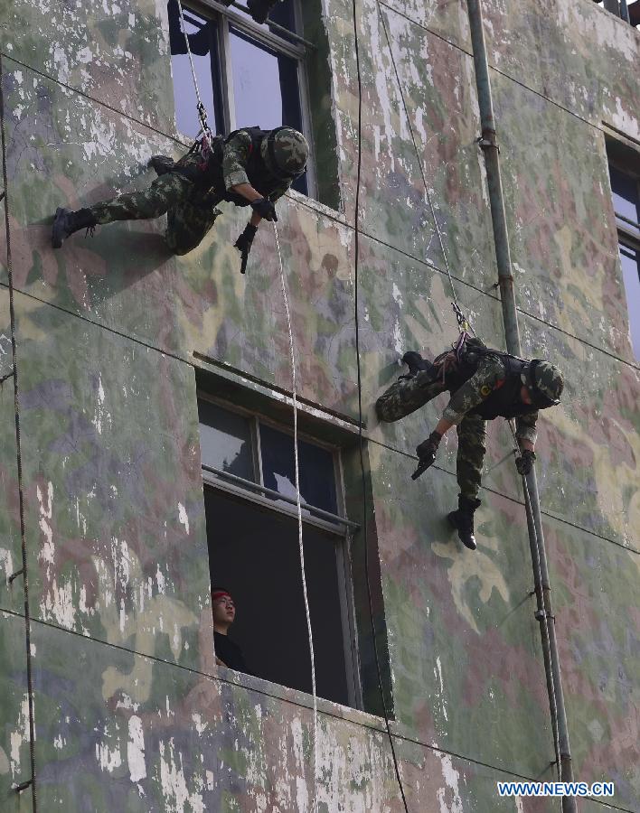 Armed policemen take part in anti-terrorism drill in Nanchang