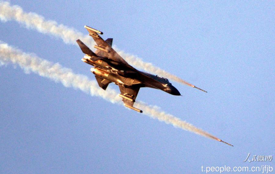 J-11 fighters hold live-fire training