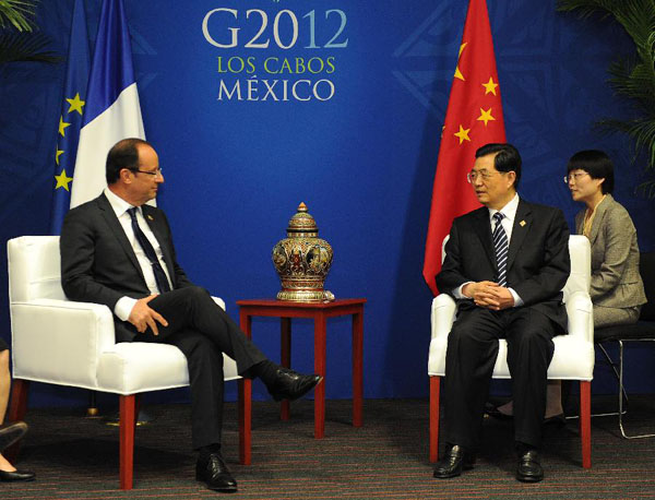 Hu, Hollande meet on sidelines of G20 summit