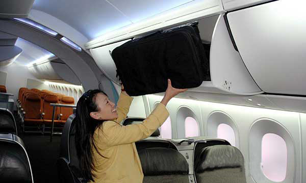 Keep large baggage away from overhead bins