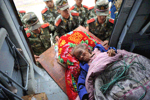 Rescue work continues as quake death toll hits 410