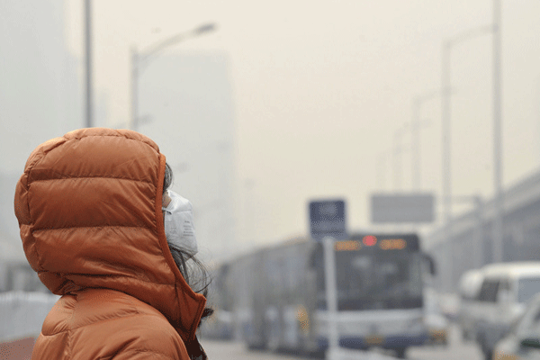 Smog stages Beijing comeback following APEC week