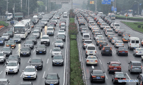 Beijing motorists to get monetary reward for driving less