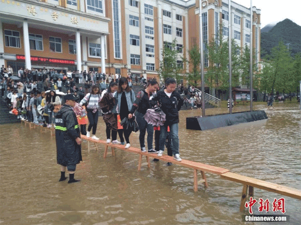 College students afraid to cross pool of water seek help of female cleaners