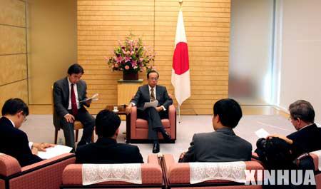 Japanese Prime Minister Yasuo Fukuda receives interviews of four Chinese media in Tokyo, capital of Japan, Nov. 15, 2007. Yasuo Fukuda on Thursday expressed his willingness to visit China at an early date and to strengthen mutual trust with Chinese leaders.