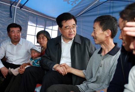 Chinese President Hu Jintao Friday went to Beichuan County of Mianyang City to visit people affected by the southwest China earthquake, encouraging them to be confident in overcoming hardships caused by the disaster.