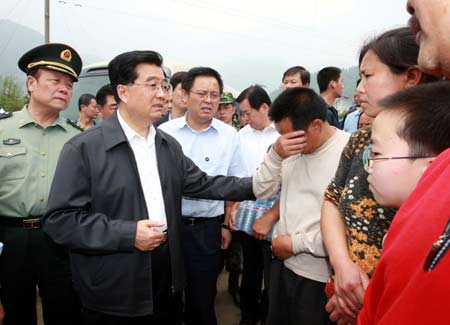 Chinese President Hu Jintao Friday went to Beichuan County of Mianyang City to visit people affected by the southwest China earthquake, encouraging them to be confident in overcoming hardships caused by the disaster.