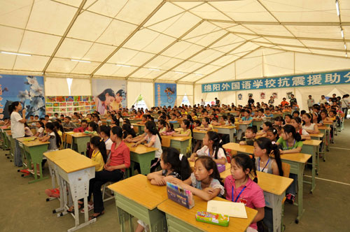 Quake-affected pupils resume classes in camp
